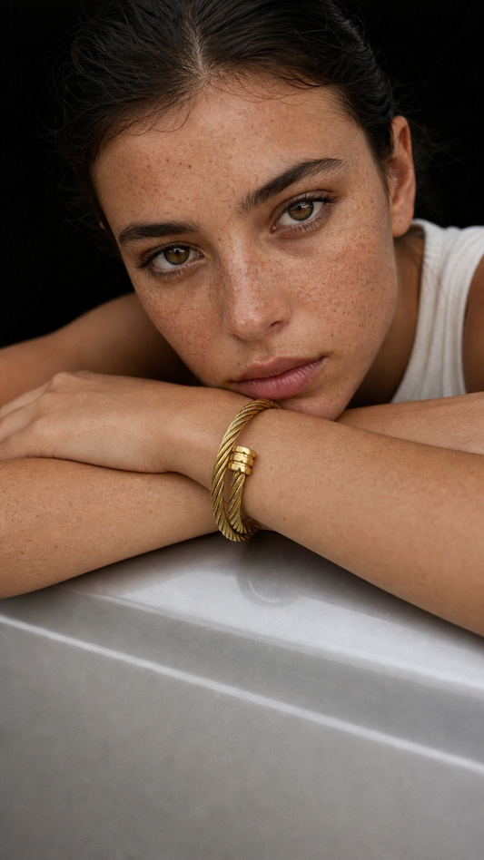 18K gold plated stainless steel bracelet in a minimalist, luxurious open design
